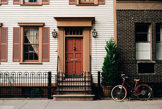 Townhouse with childs bike in front